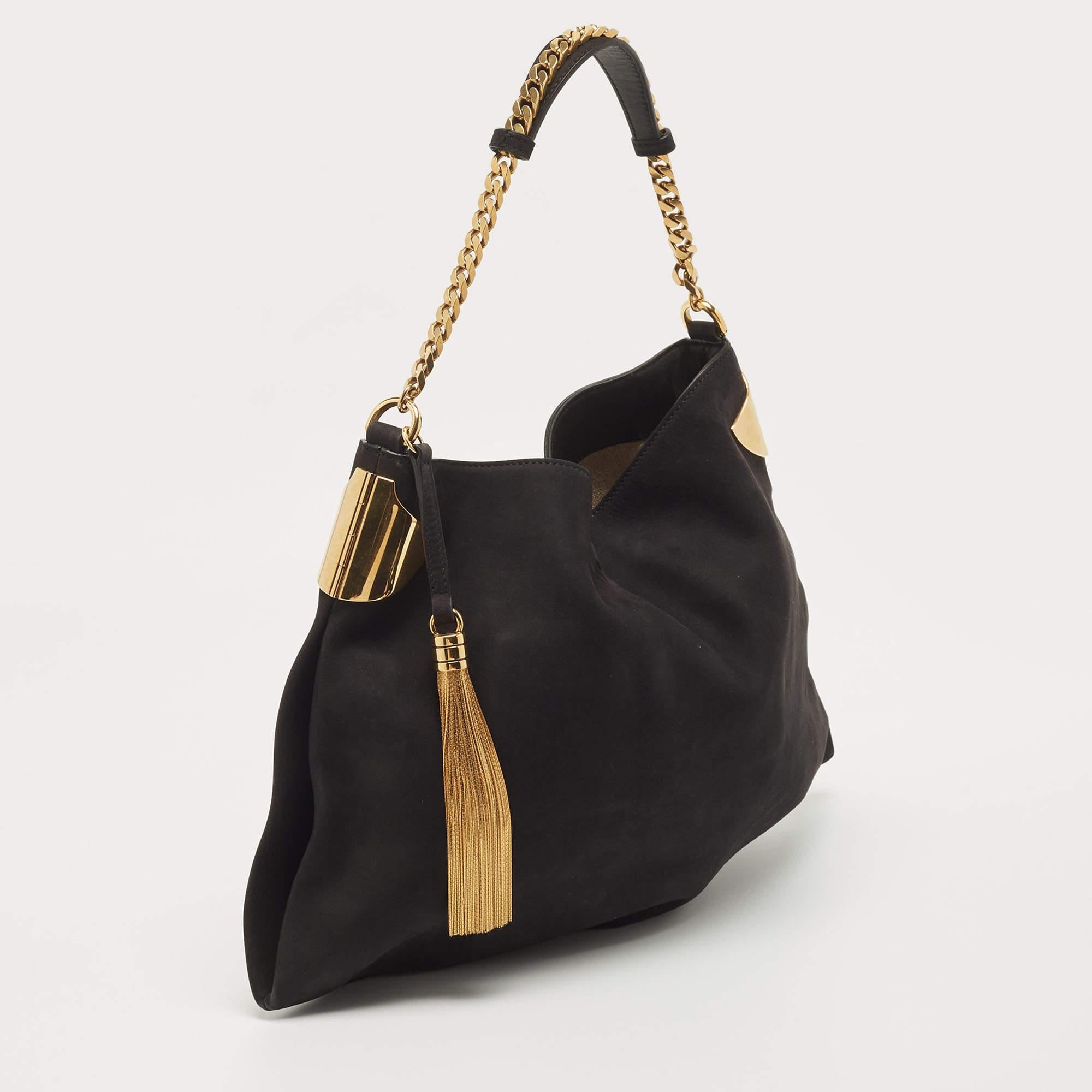 Thoughtful details, high quality, and everyday convenience mark this Gucci 1970 bag for women. The bag is sewn with skill to deliver a refined look and an impeccable finish.

