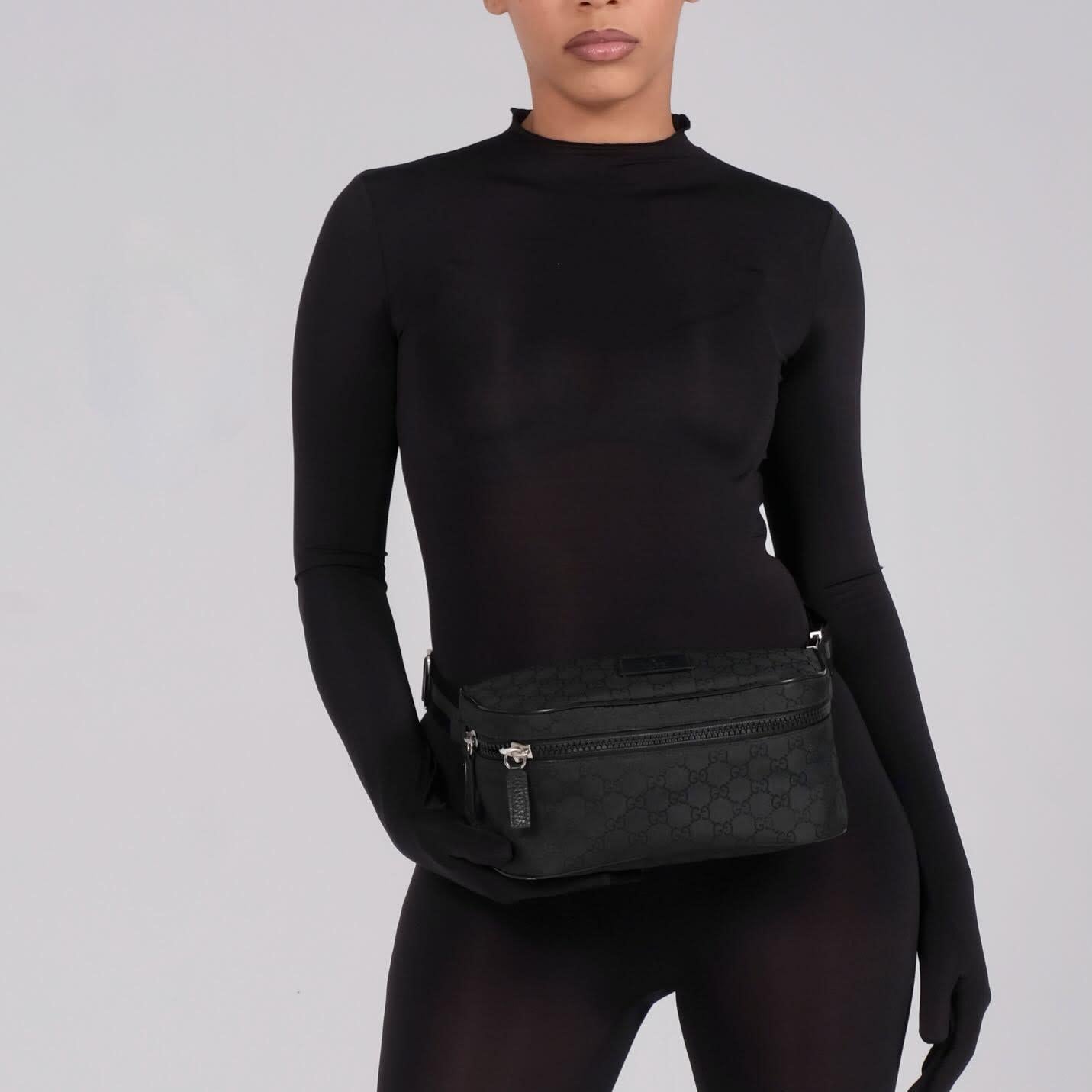 Color: Black monogram
Material: Nylon canvas with leather finishes 
Model No. 449182
Comes with: Dust bag
Condition: Excellent.
Made in Italy

Measurements~
Height 4.5”
Width 10.5”
Depth 5.5”
Belt length: 30” - 42