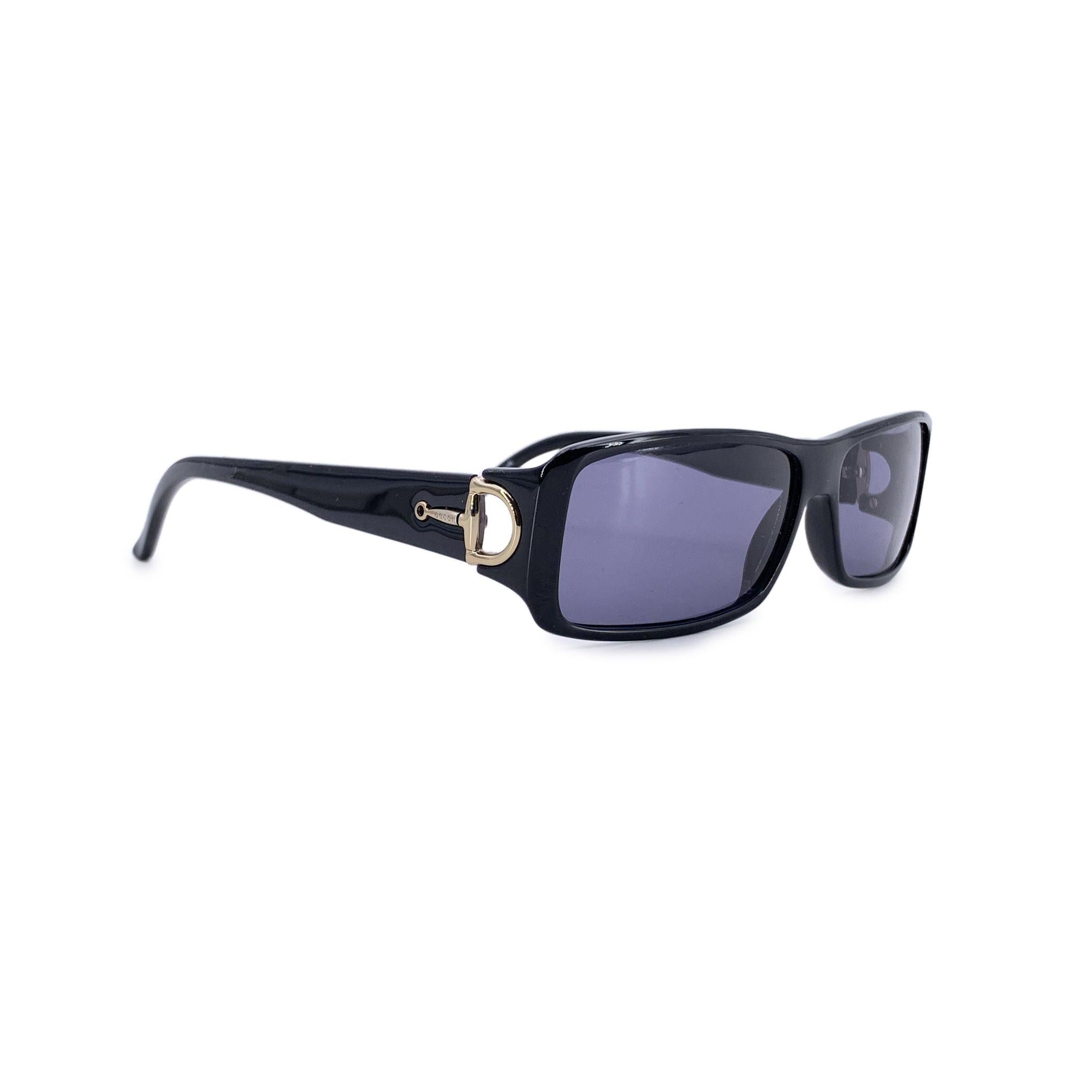 Step into the world of sleek sophistication with the Gucci GG 1524 sunglasses-an iconic model. Crafted with precision and poise, these rectangular black frames embody everything the Gucci name stood for in that glamorous era: luxury, refinement, and