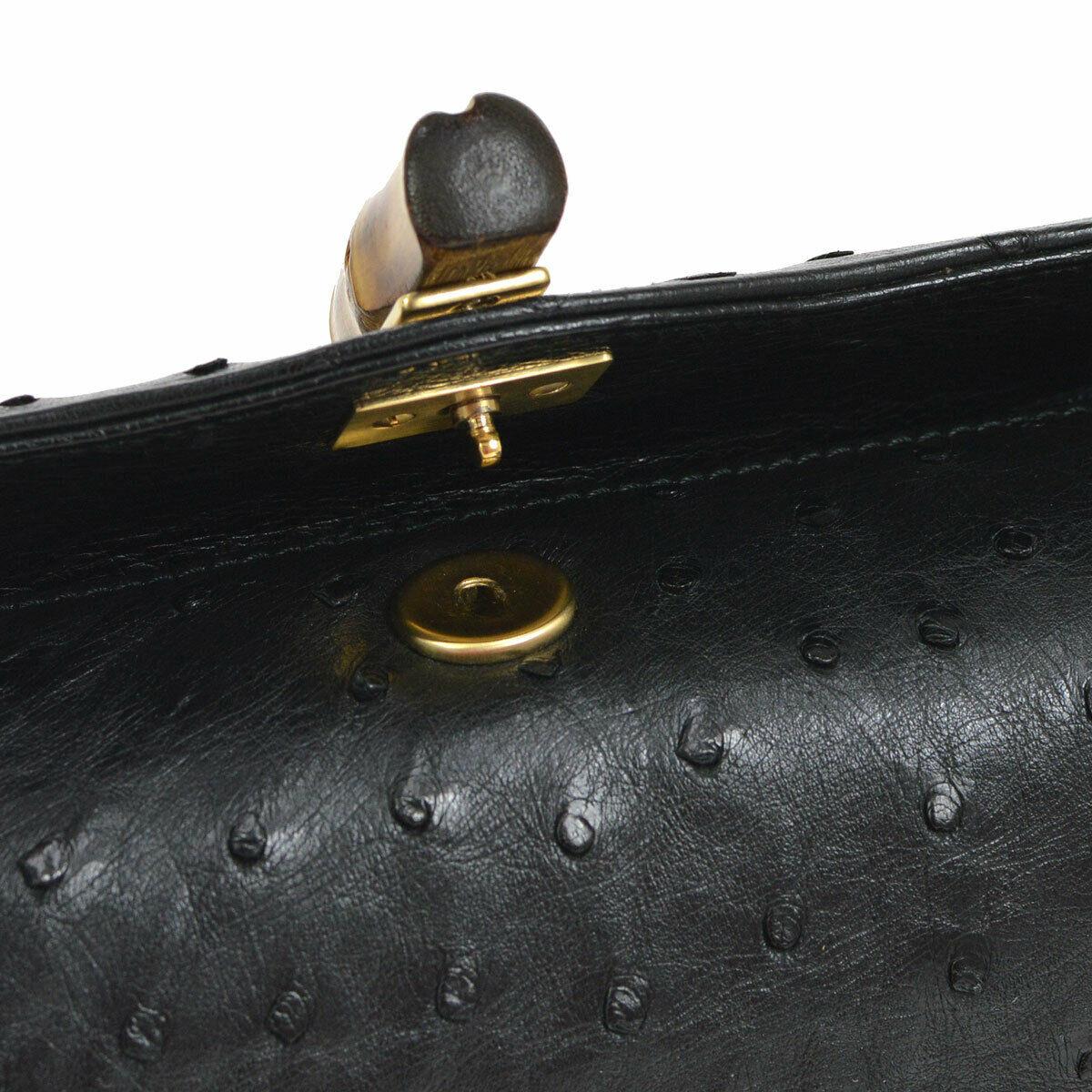 Gucci Black Ostrich Exotic Leather Mini Small Bamboo Kelly Style Top Handle Satchel  Evening Shoulder Bag  

Ostrich leather
Bamboo
Gold tone hardware
Made in Italy
Handle drop 6
