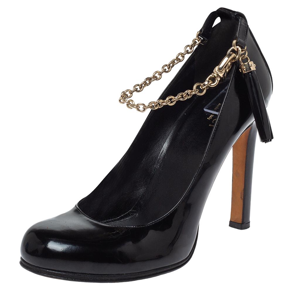 Wear these classy pumps from Gucci for a grand evening out and get all the compliments. These pumps are made from patent leather and feature round toes, chain ankle straps accented with a leather tassel and high heels. The insoles are leather-lined