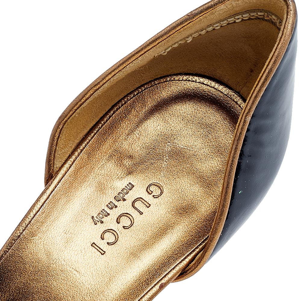 Look trendy in this pair of D'orsay pumps from Gucci. Designed to excellence, this pair is created using black patent leather on the exterior and flaunts 11 cm heels. This gorgeous pair of pumps will render an edgy touch to your everyday outfit.

