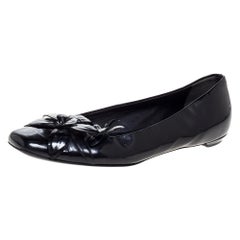 Gucci Ballerine in vernice nera impreziosite da fiori taglia 37