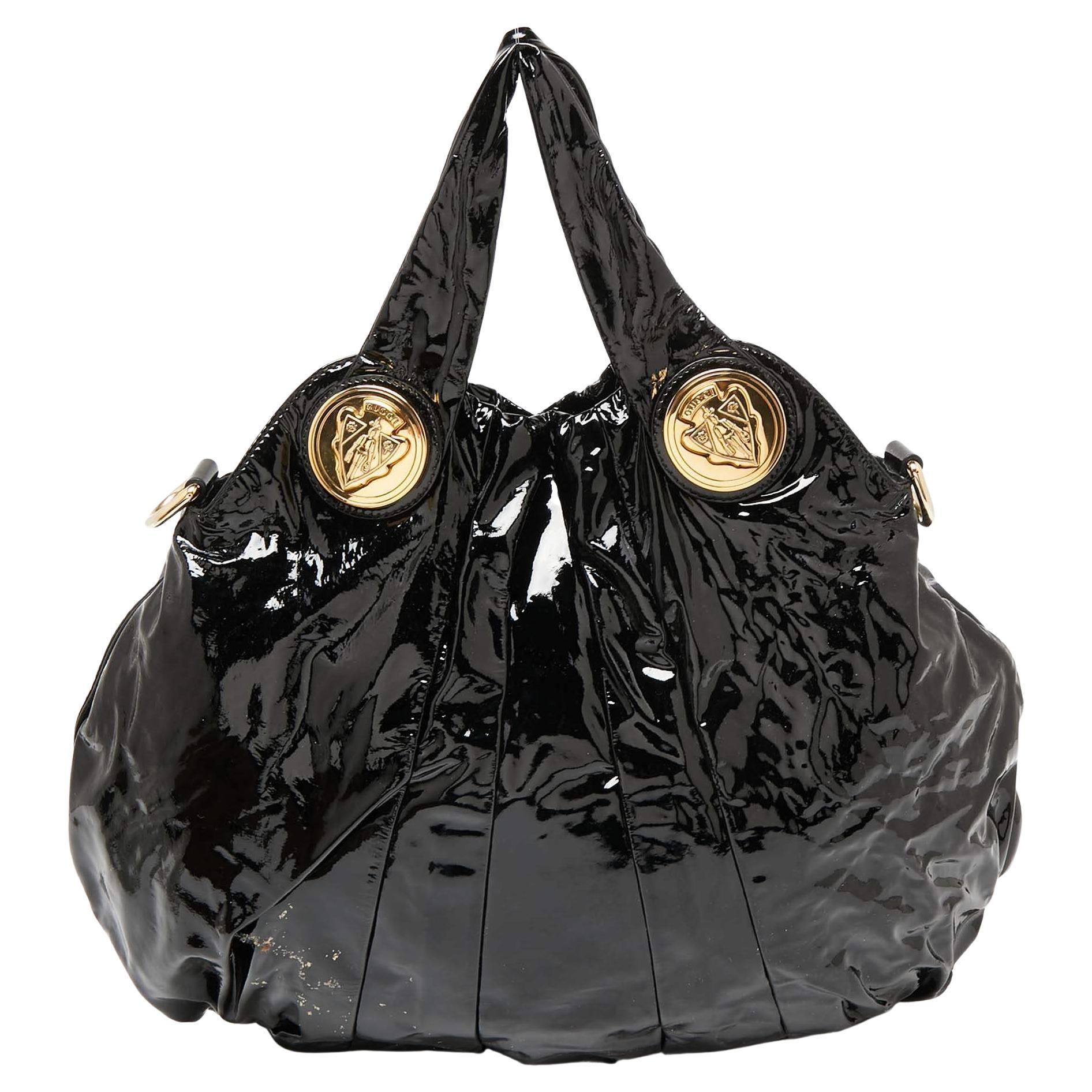 Gucci Große Hysteria-Tasche aus schwarzem Lackleder