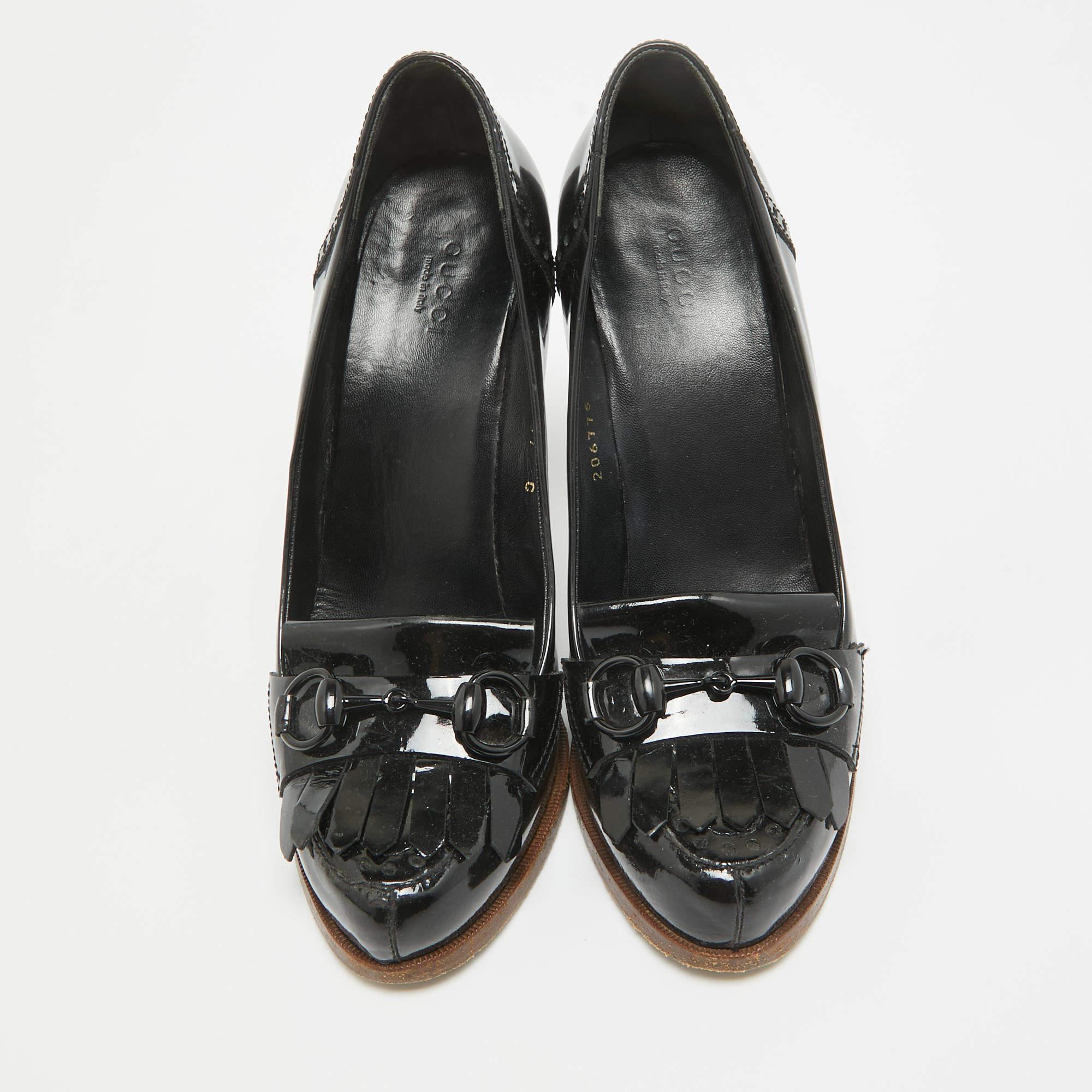 Make a statement with these Gucci black pumps for women. Impeccably crafted, these chic heels offer both fashion and comfort, elevating your look with each graceful step.

