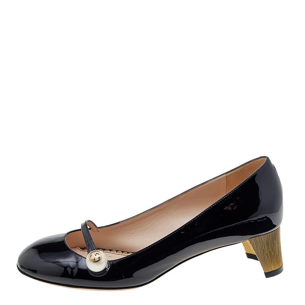 These Gucci pumps come in a Mary Jane look and are as feminine and stylish as they can get — thanks to the logo-accented pearl detail, the slightly squared toes, and gold-tone curved heels. These stunning patent leather pumps will help add a chic