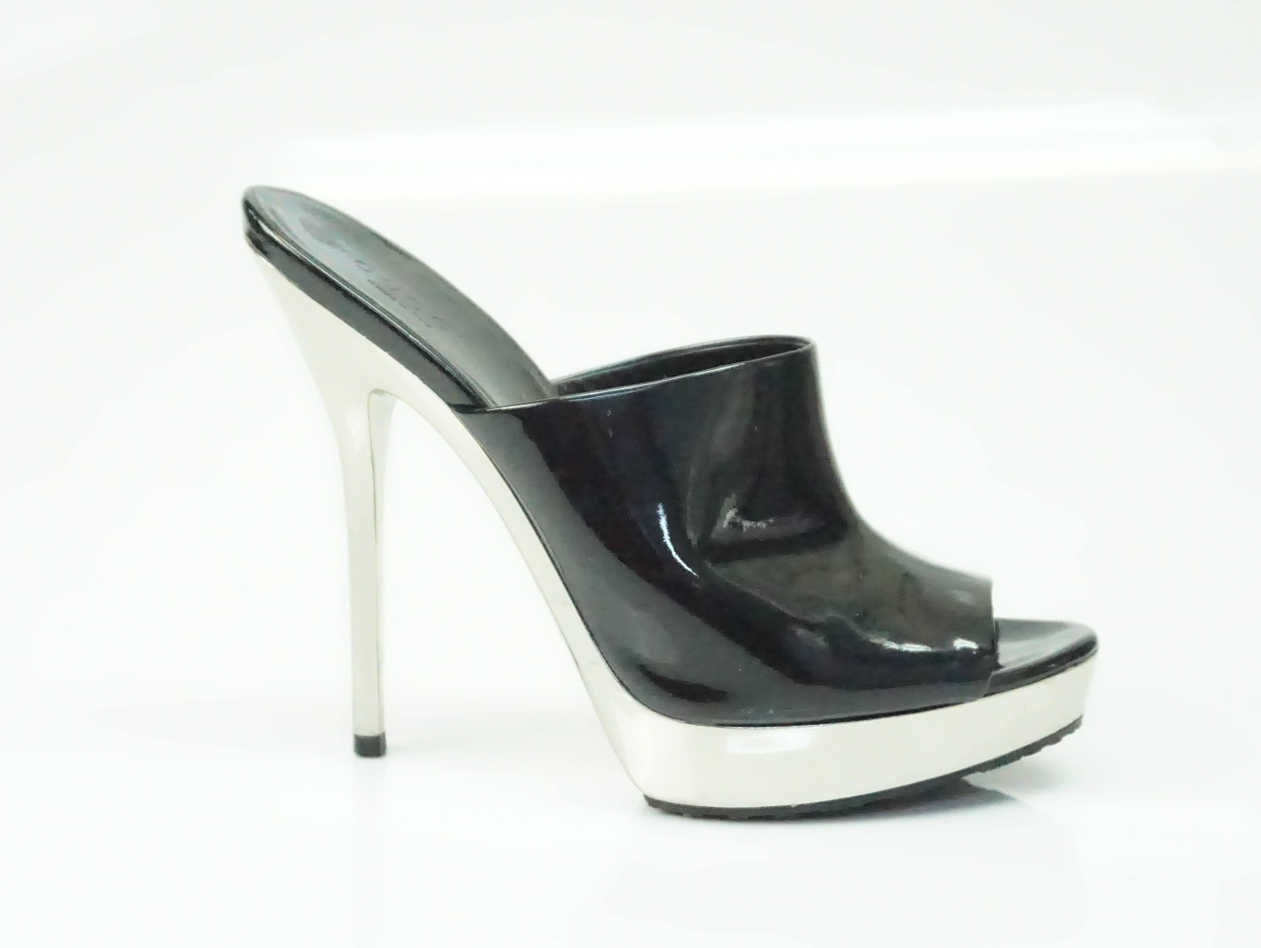 Gucci Black Patent Leather Platform Slide Sandal Heel - 36 These beautiful Gucci pumps are in excellent condition. There are a few scratches near the toe area and around platform. 
Heel length: 5