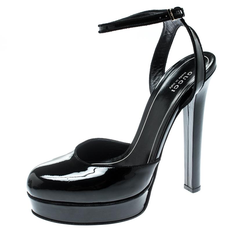 These patent leather sandals are edgy, look fashionable and chic. Stay in style as you step out in these uber comfortable leather sole sandals from Gucci, that are one of a kind in trendy women's footwear. Transform into the style diva that you are