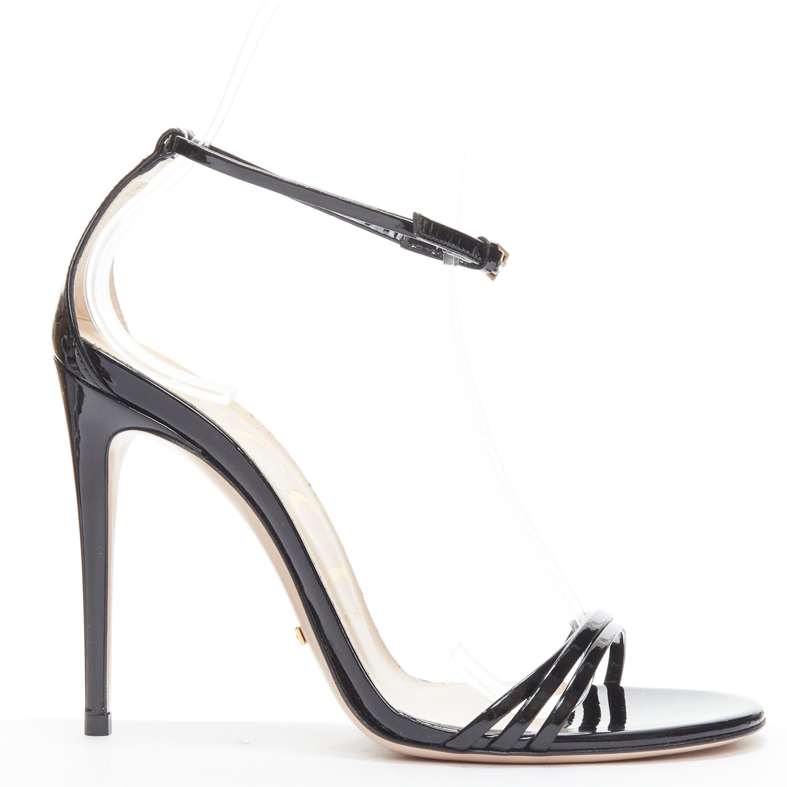 GUCCI black patent minimalist simple strappy high heel sandals EU37.5 
Reference: TGAS/B02015 
Brand: Gucci 
Designer: Alessandro Michele 
Material: Patent Leather 
Color: Black 
Pattern: Solid 
Closure: Buckle 
Made in: Italy 

CONDITION: