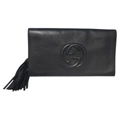 Gucci Pochette con nappe Soho in pelle di vitello nera