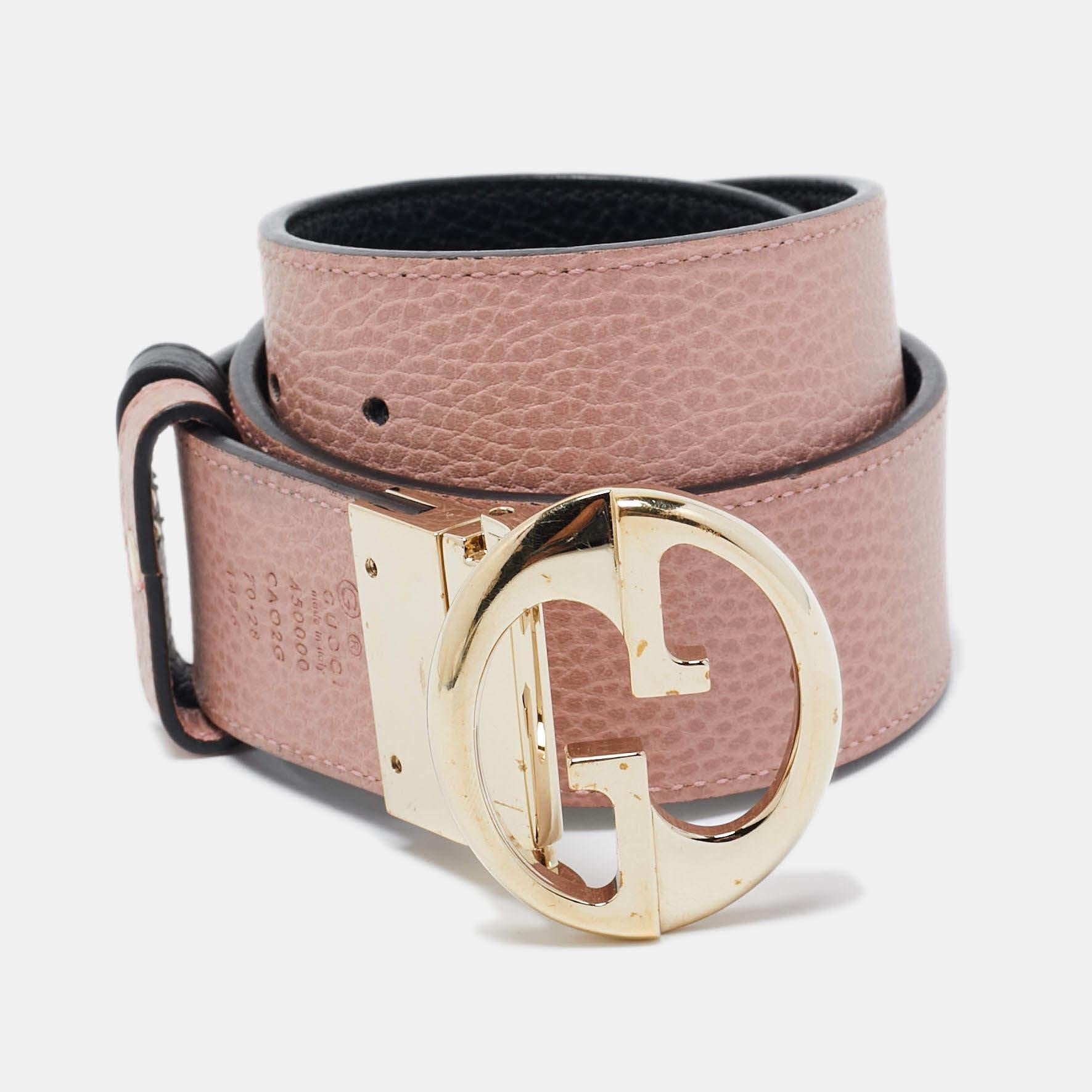 This Gucci belt is crafted from leather. The classic piece has dual shades to match a variety of outfits. It is completed with a gold-tone interlocking G buckle.

Includes
Original Dustbag