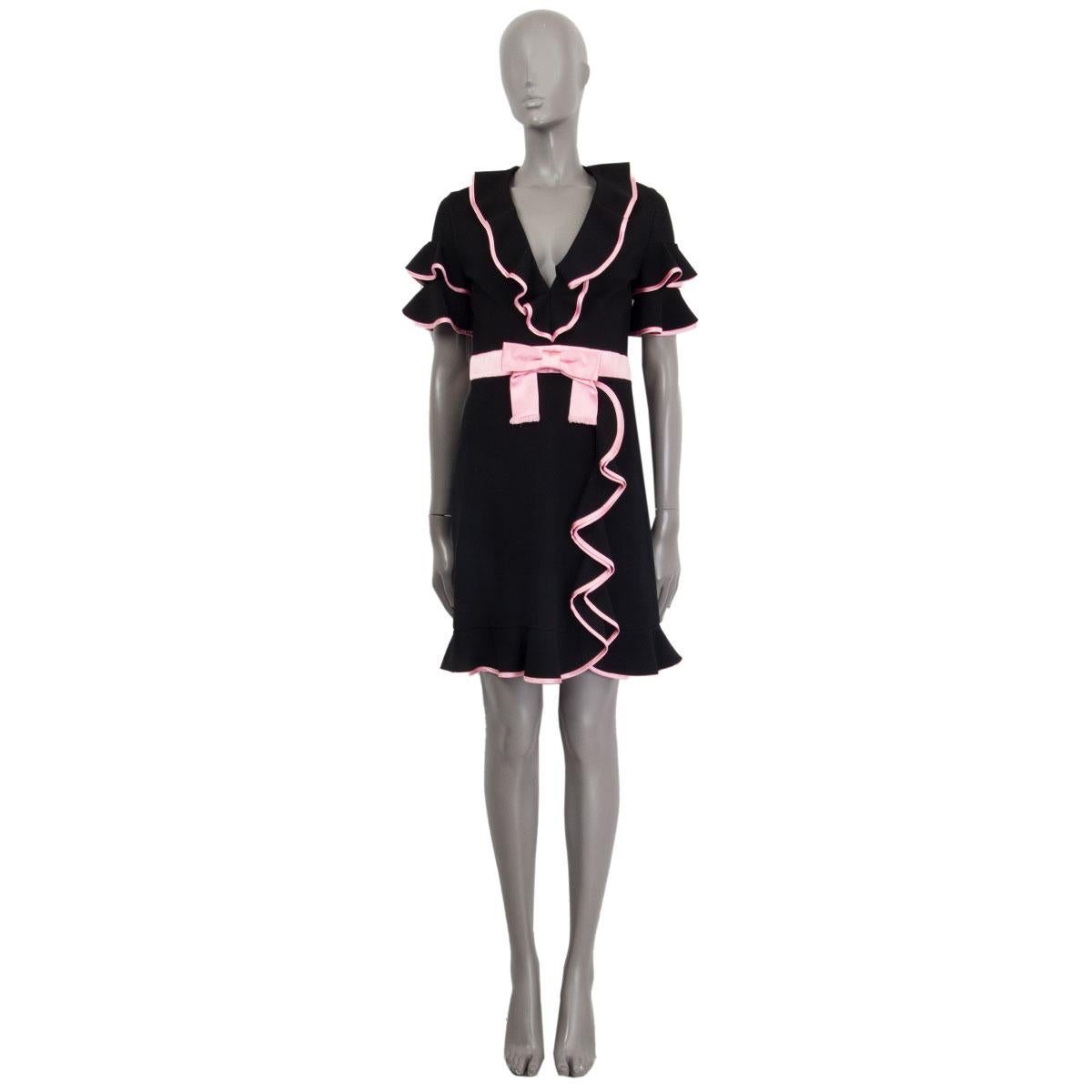 100% authentic Gucci short sleeve bow detail babydoll dress in black and bubblegum pink polyamide (92%) and elastane (8%) with a deep v-neck. Closes on the back with a zipper. Unlined. Has been worn and is in excellent condition. 

Measurements
Tag