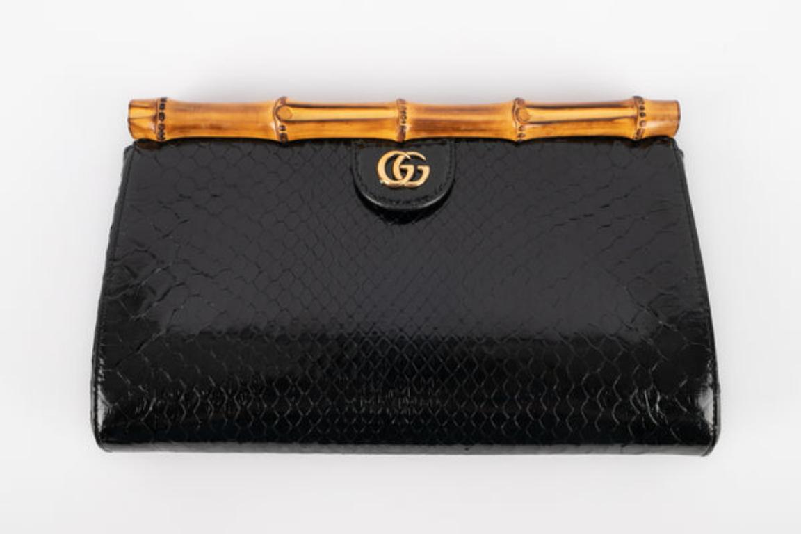 Gucci Black Python Clutch In Excellent Condition For Sale In SAINT-OUEN-SUR-SEINE, FR