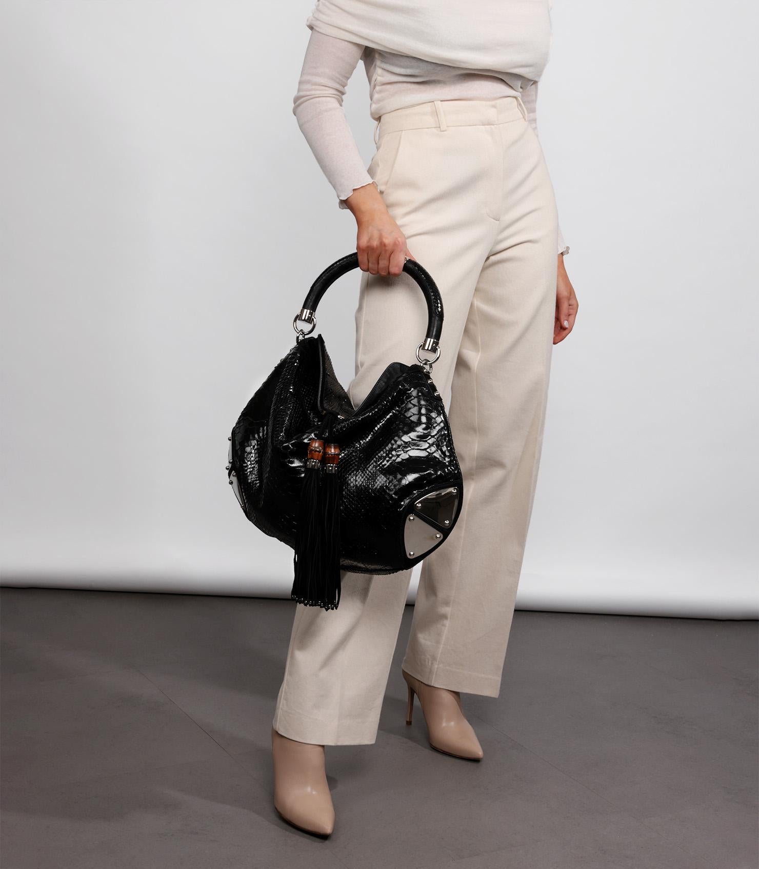 Gucci Black Python Leather Vintage Large Indy Top Handle

Brand- Gucci
Model- Large Indy Top Handle
Product Type- Shoulder, Top Handle
Serial Number- 17***********
Accompanied By- Gucci Dust Bag
Colour- Black
Hardware- Silver
Material(s)- Python