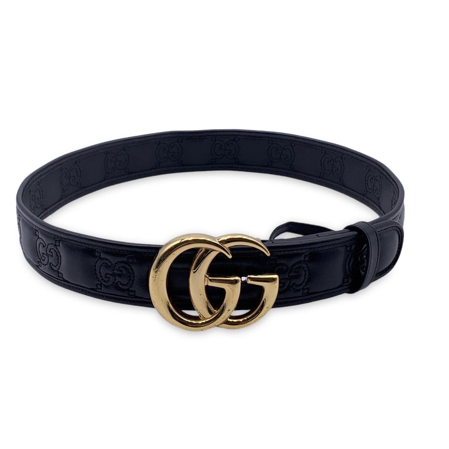 This beautiful Belt will come with a Certificate of Authenticity provided by Entrupy. The certificate will be provided at no further cost

Gucci Marmont belt in black quilted leather with GG logo pattern. Gold metal GG buckle (2.25 inches - 5.7 cm