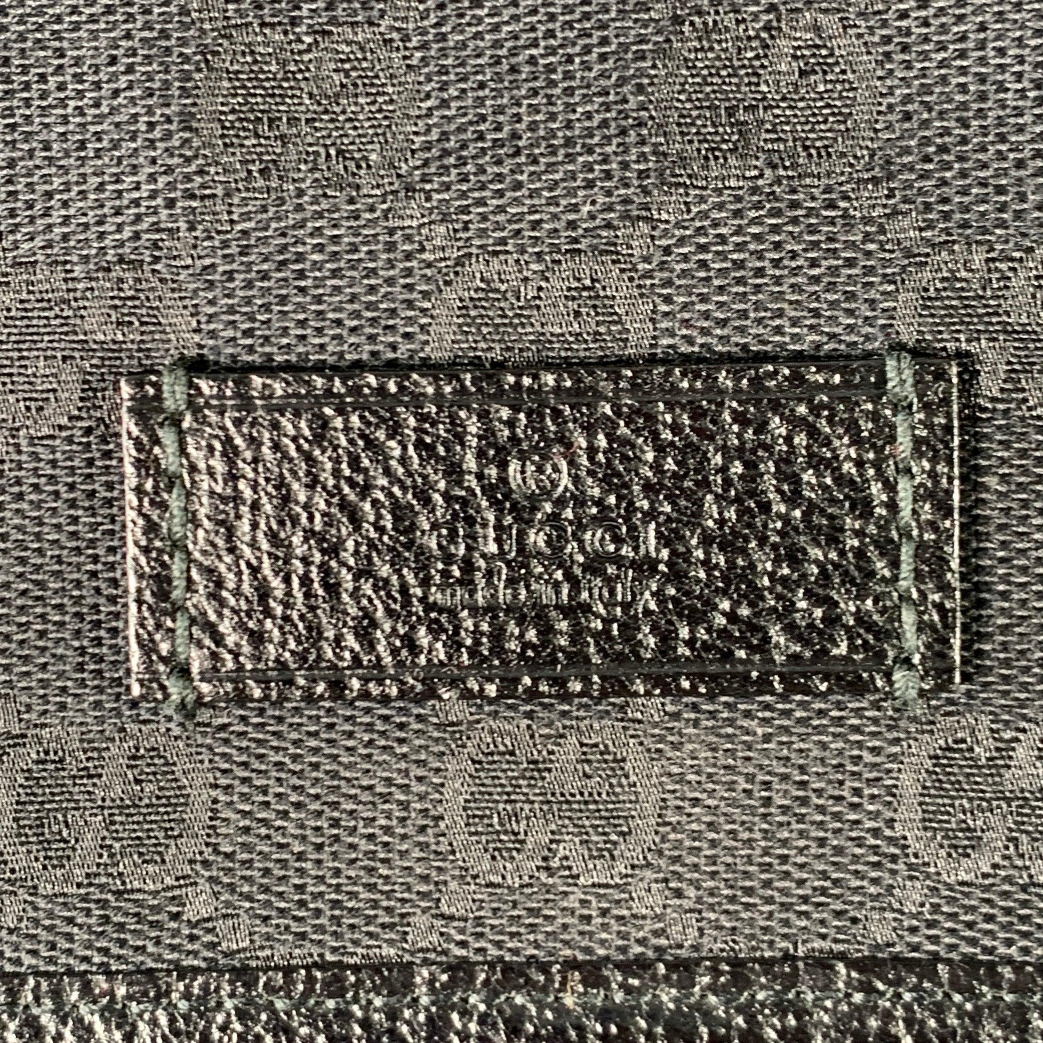 GUCCI messenger bag
in a black canvas featuring all over Guccissima monogram pattern, black leather trim, and a red and green Gucci Vintage Web crossbody strap.
Comes with dust bag. Made in Italy.Very Good Pre-Owned Condition. 

Marked:   233052