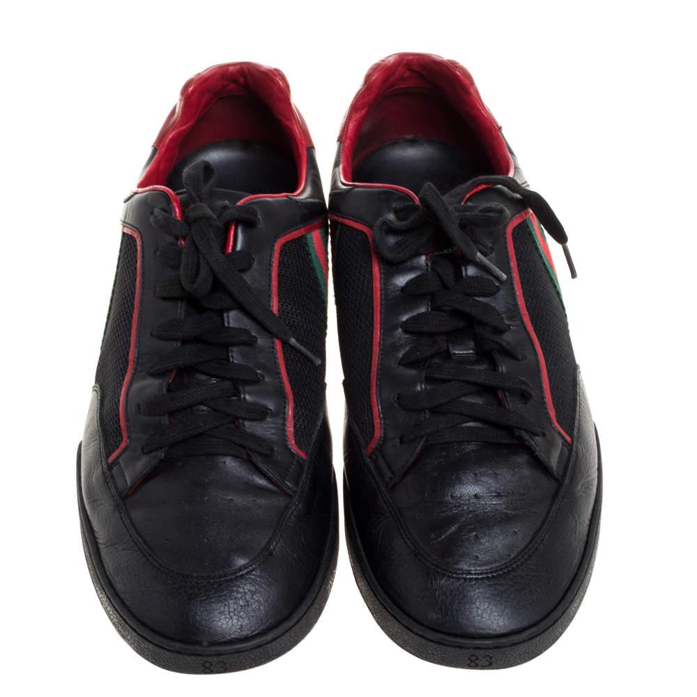 These tennis sneakers from Gucci are crafted from mesh fabric and leather and flaunt a low top frame. It features the signature web detailing on the side panels, round toes, and laces on the vamps. The black and red combination is the key detail of