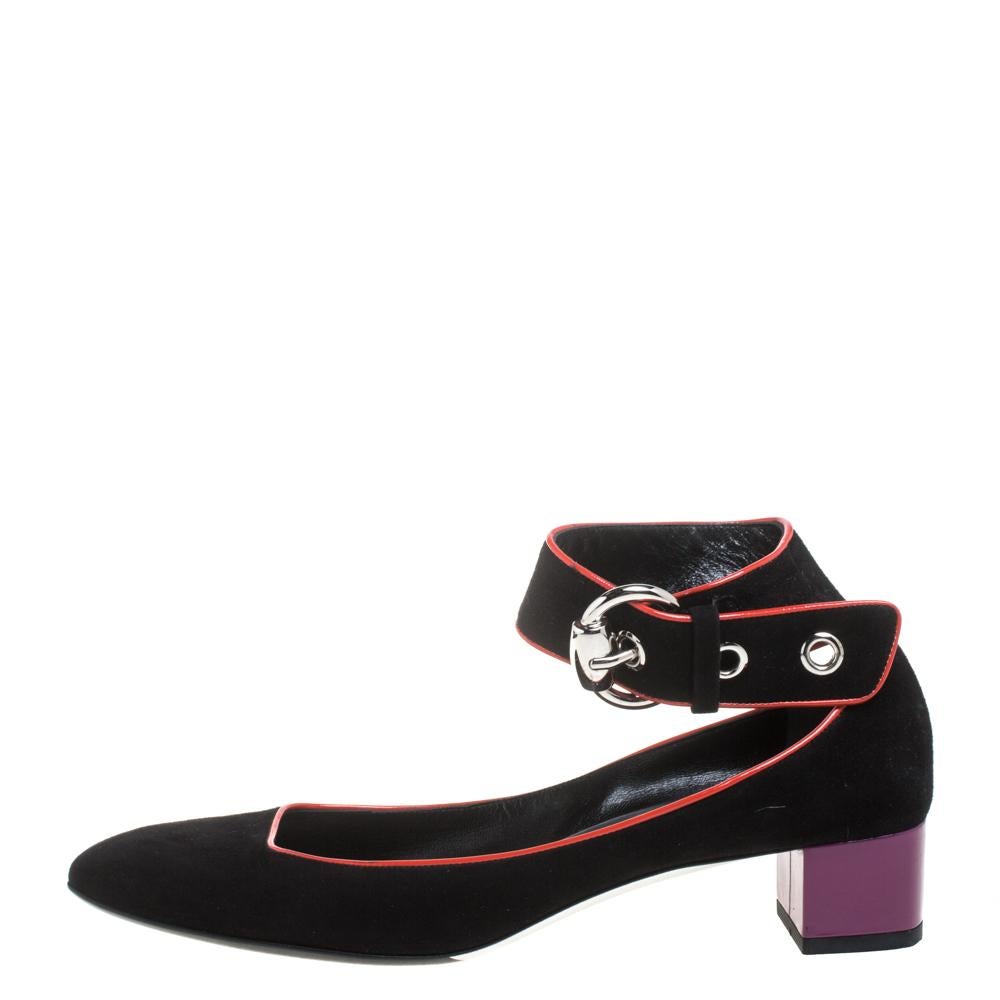 These elegant Gucci sandals will be your favorite go-to option for any special occasion. They have been crafted from suede and flaunt a black shade. These sandals are styled with square toes, red patent leather trims, buckled ankle straps, and low