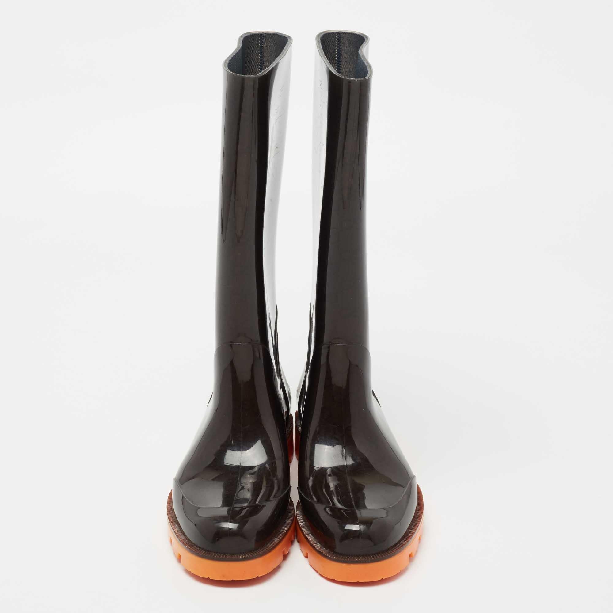 These Gucci rain boots are extremely well crafted and stylish. They have a black rubber exterior and a simple design with rounded toes, smooth insoles, and durable rubber soles.

Includes: Original Dustbag