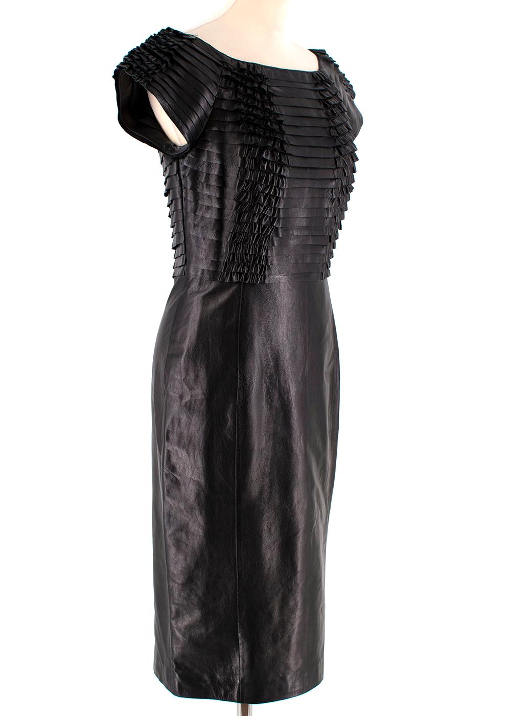 Gucci Black Ruffled Leather Dress

- Pleated layers on the upper body 
- Soft lamb skin leather
- Silk black lining
- Mid weight fabric 
- Capped short sleeves
- Pencil skirt just below the knee
- Wide round neck
 
Made in Italy

Professional