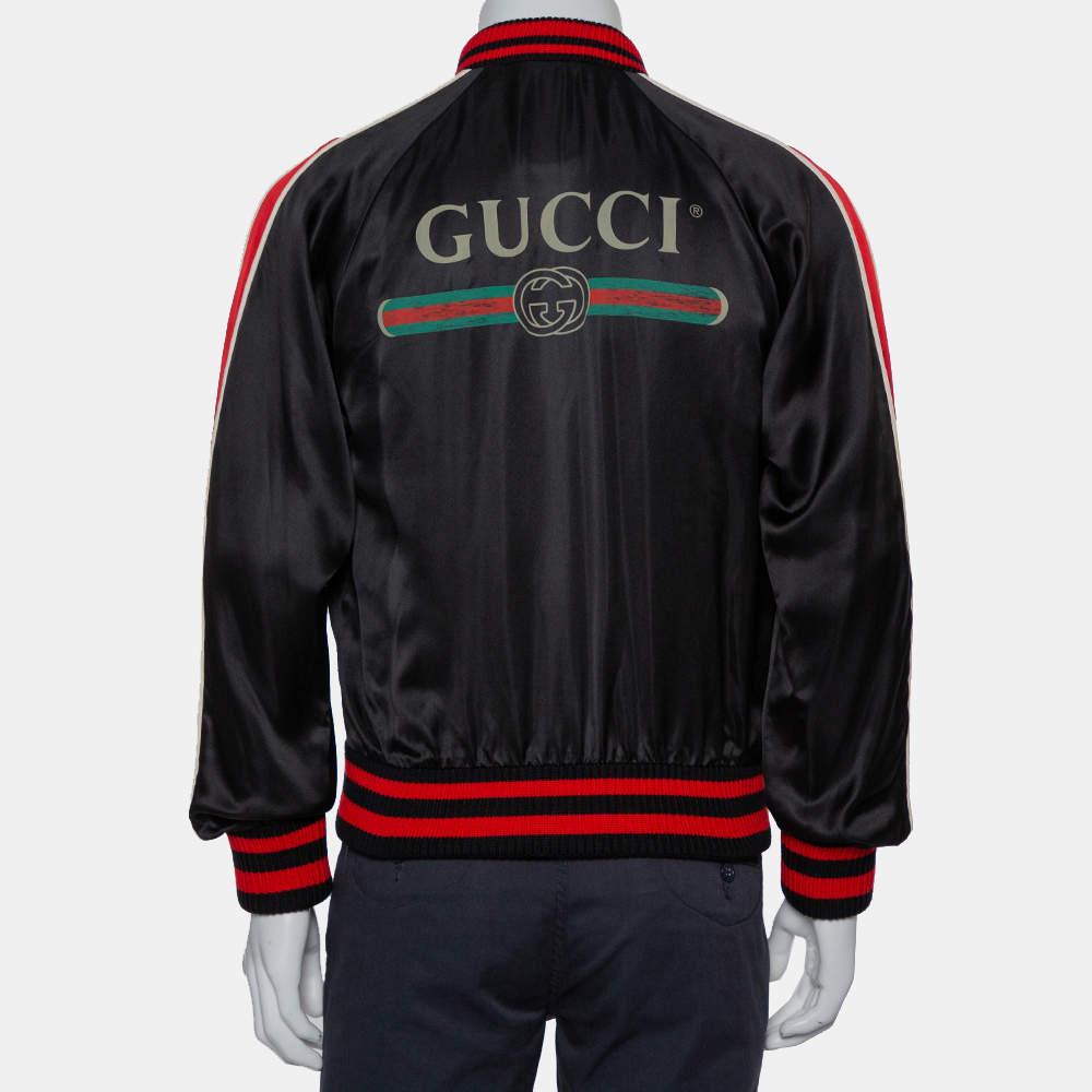 If you have an eye for fun clothing then this jacket by Gucci will surely impress. Adopt a contemporary style with satisfaction through this black creation made from satin fabric. It features a zip button fastening, a Spiritismo applique at the