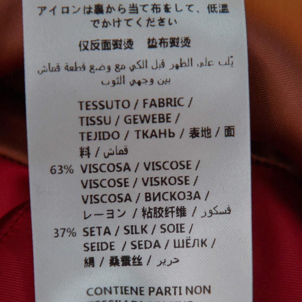 Gucci Chaqueta bomber de satén negro con ribetes en contraste Spiritismo con detalle de apliques M 1