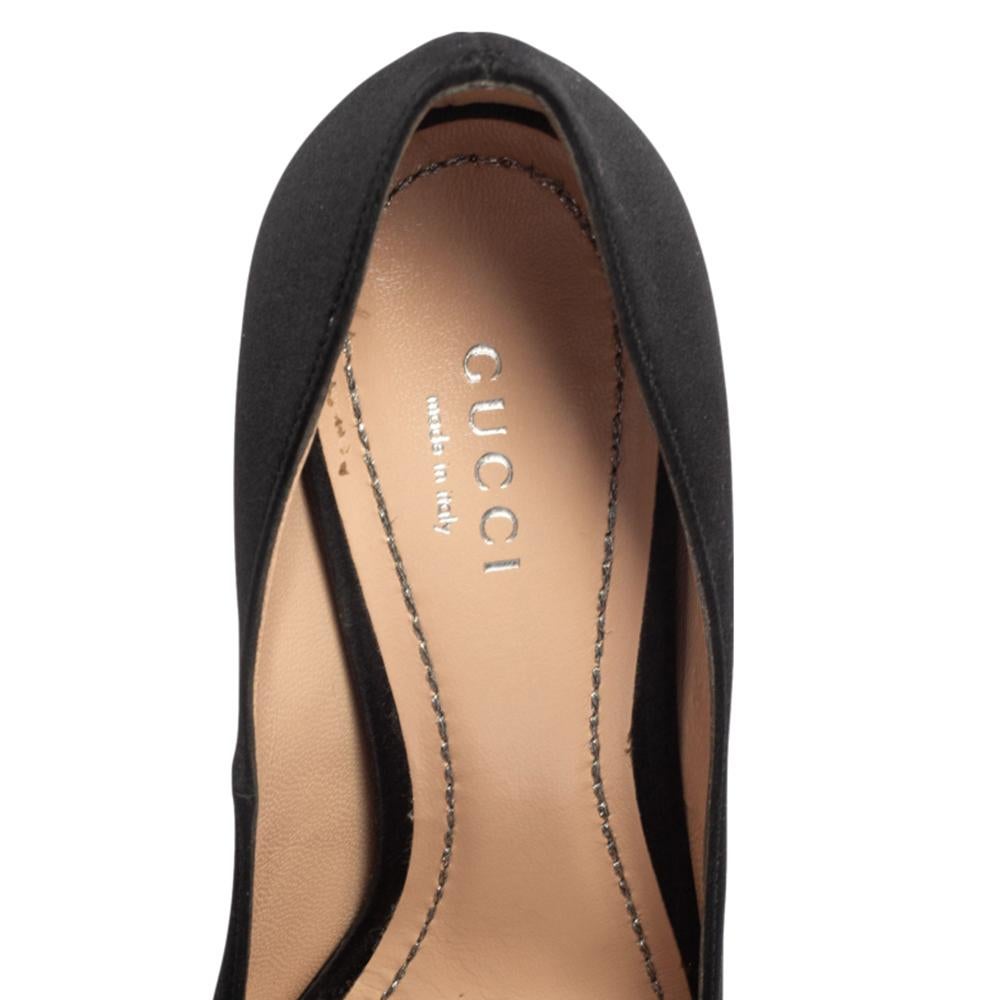 Gucci's timeless aesthetic, love for motifs from mythologies, and stellar craftsmanship in shoemaking are evident in these stunning pumps. They flaunt square toes with Dionysus accents on the vamps, comfortable leather-lined insoles, and 10 cm