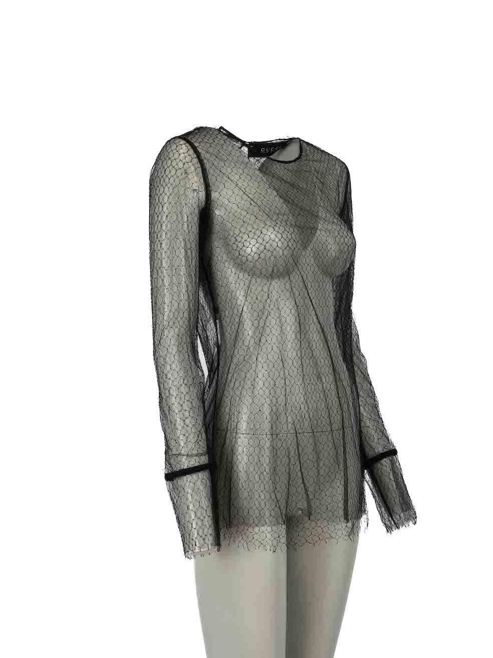 CONDITION is Very good. Minimal wear to top is evident. Minimal wear to mesh with some minor plucks and fraying of the weave seen throughout on this used Gucci designer resale item.
 
Details
Black
Synthetic
Top
See-through
Long sleeves
Net and