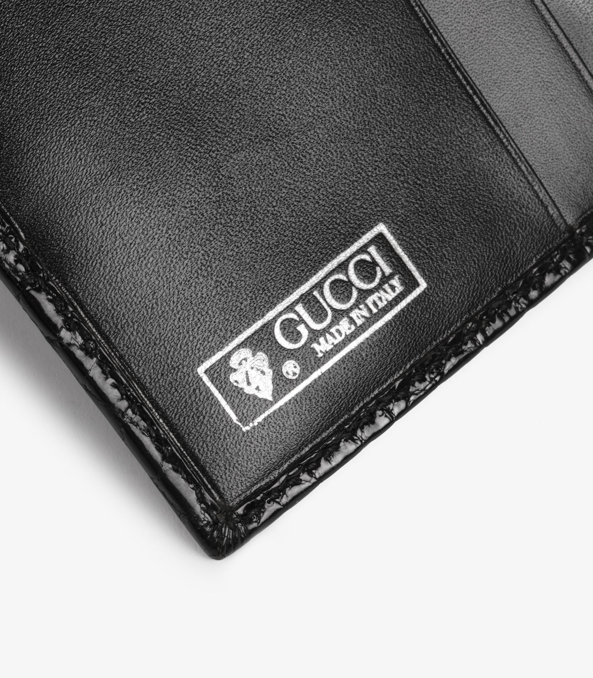 Women's or Men's Gucci Black Shiny Alligator Leather Vintage Stirrup Wallet For Sale