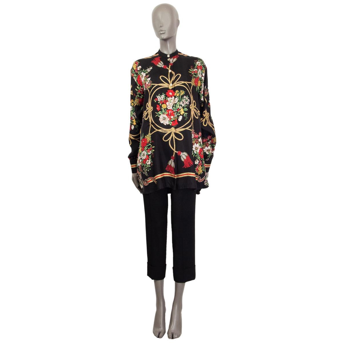 100% authentic Gucci oversized floral and tassel print shirt in black, red, white, beige, green and yellow silk twill (100%) in reminiscent of vintage silk scarfs. Opens with a half-button line at front. Has been worn and is in excellent condition.