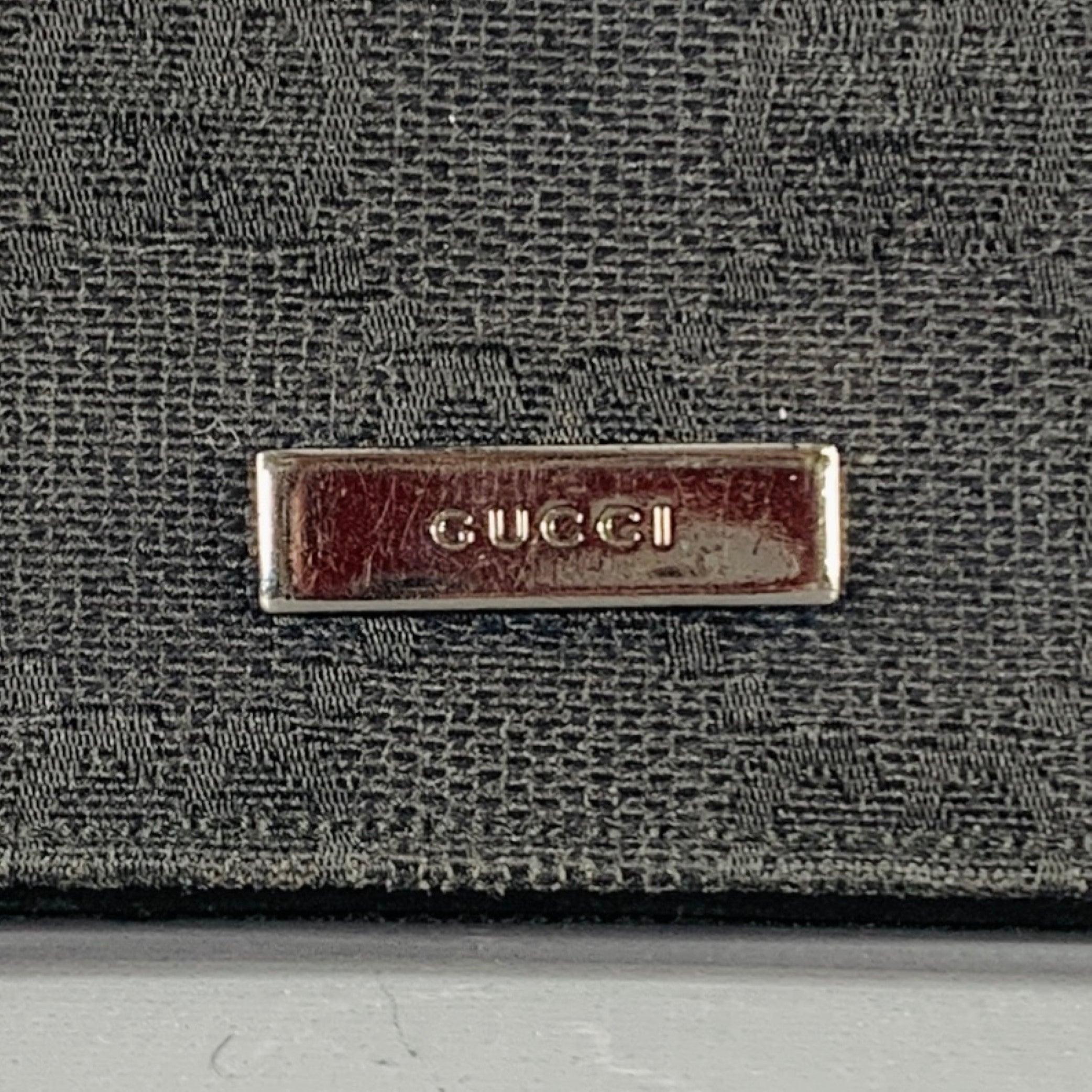 GUCCI wallet
in a black canvas and black leather featuring Guccissima monogram pattern, and bifold style with interior pocket with keyring. Made in Italy.Excellent Pre-Owned Condition.4.25 X 2.25 inches 
  
  
 
Sui Generis Reference: