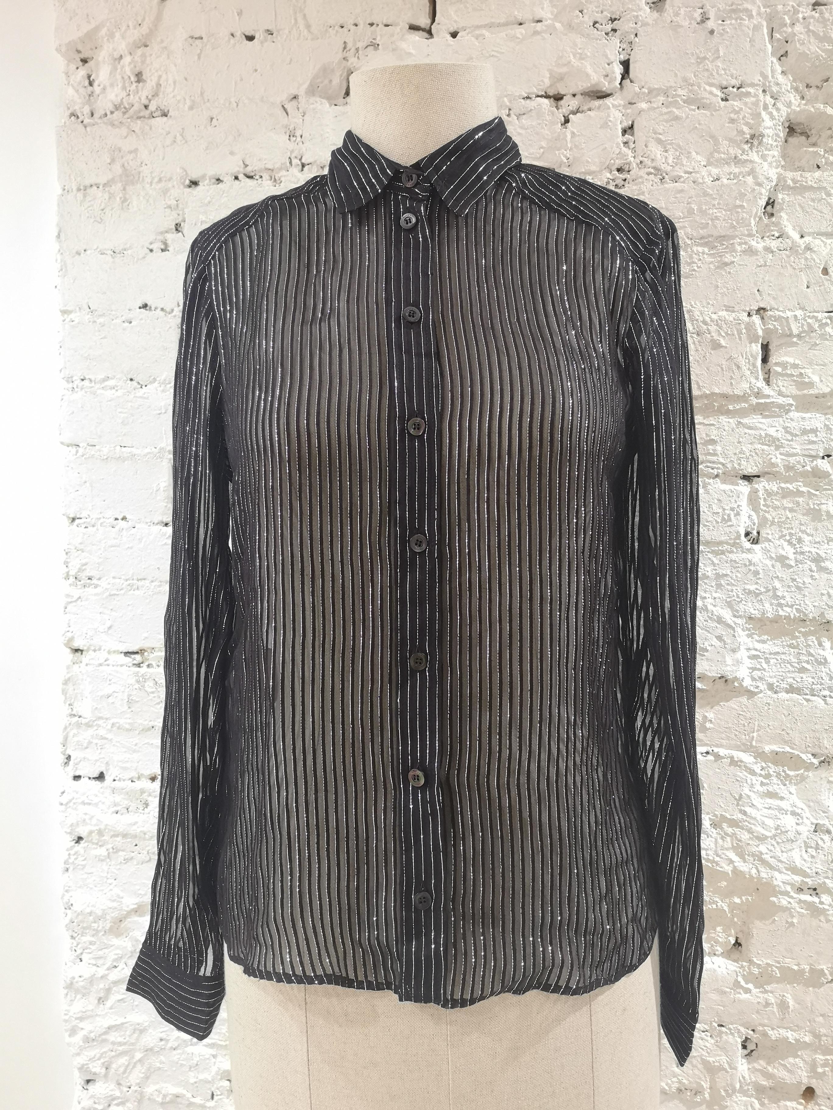 Gucci black silver see-through silk shirt
Gucci by Tom Ford black see-through shirt with silver stripes
totally made in italy in size 40