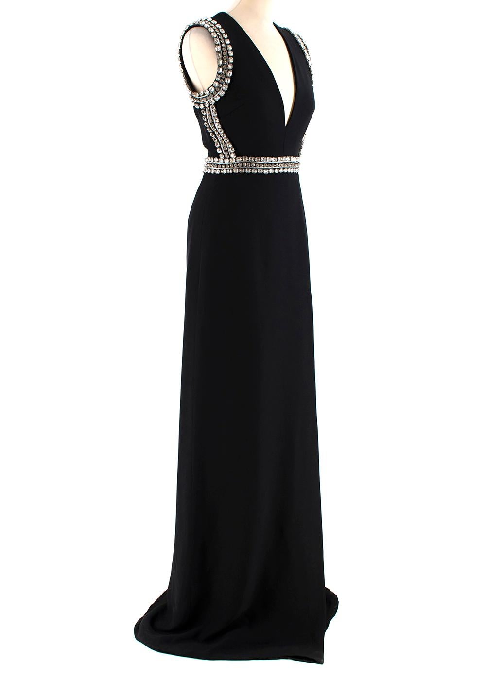 Gucci Black Sleeveless Crystal Embellished Gown

- Gown
- Featuring crystal embellishment
- The sleeves and bodice feature silver piping and gem embellishment
- Zip at the back of the garment 

Made in Italy

Measurements are taken with the item