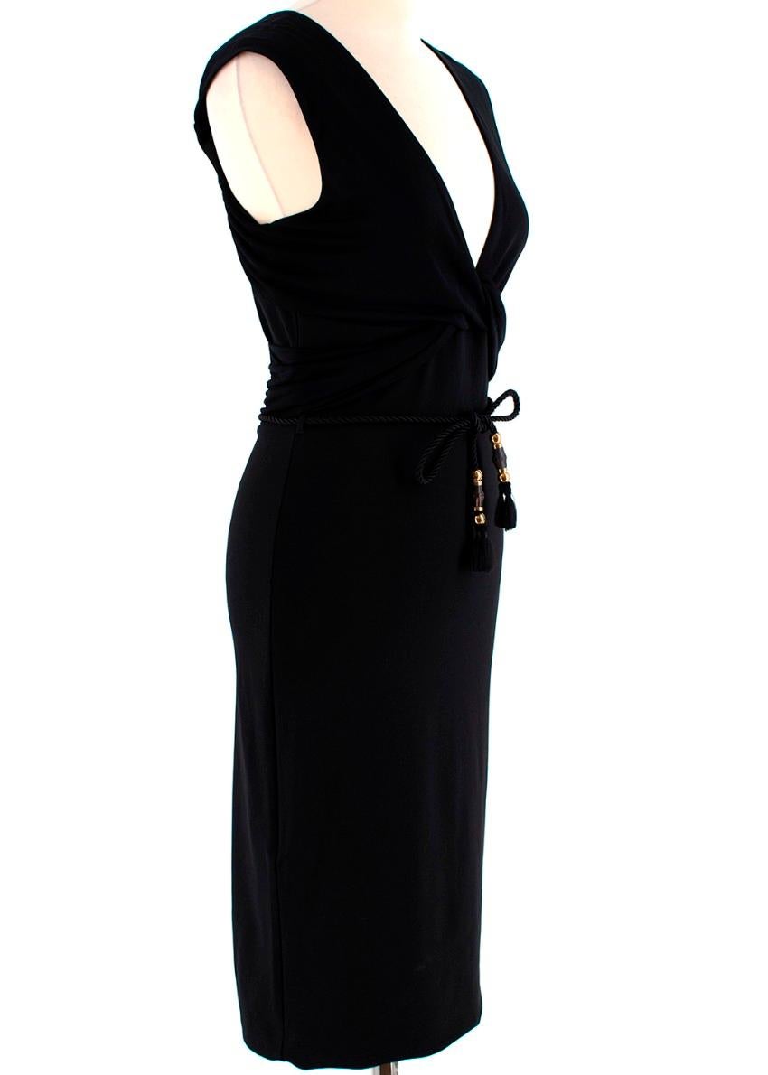 Gucci Black Dress With Rope Belt 

- Twisted detail neckline 
- Low neck
- Rope belt with tassels and gold hardware 
- Gold back zip fastening 
- Mid-length 

Materials:
Fabric 1:
- 98% Viscose
- 2% Elastane 
Fabric 2:
- 100% Viscose 
Lining:
- 65%