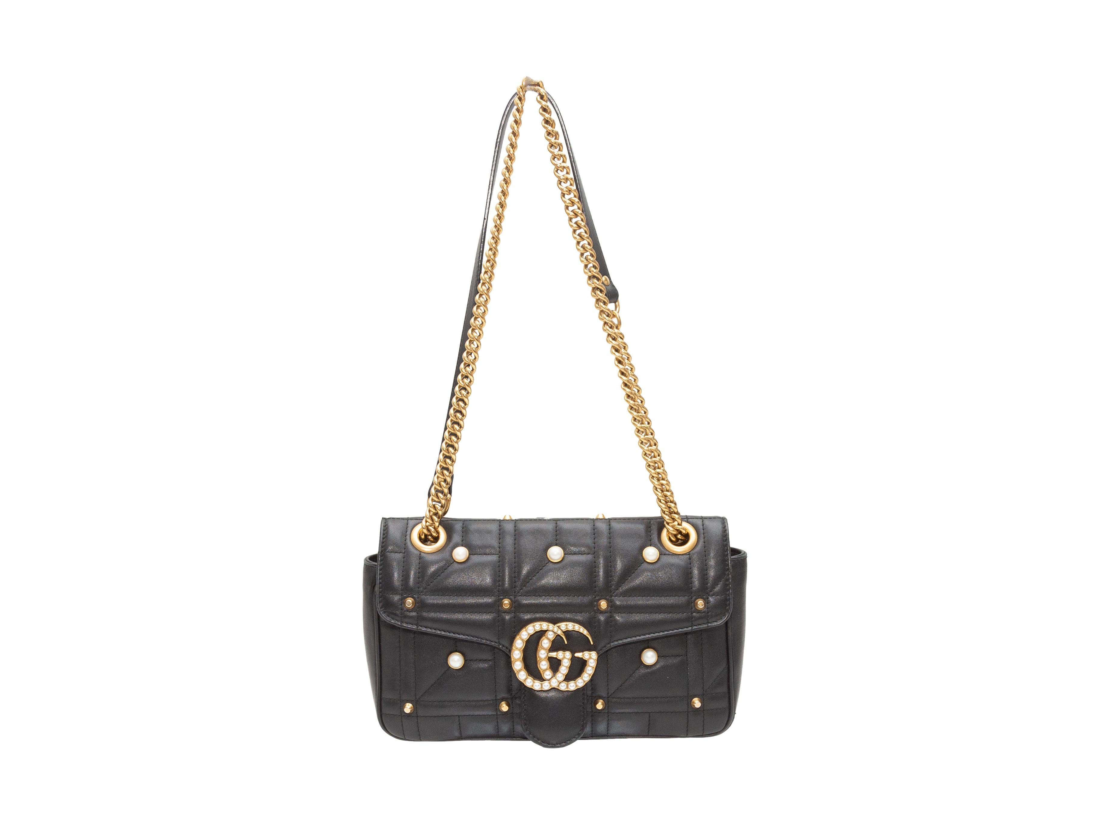 Product details: Black Gucci Small GG Marmont Matelasse Bag. This bag features a leather body, gold-tone hardware, a chain-link and leather strap, faux pearl embellishments throughout, and a GG closure at the front flap. 10