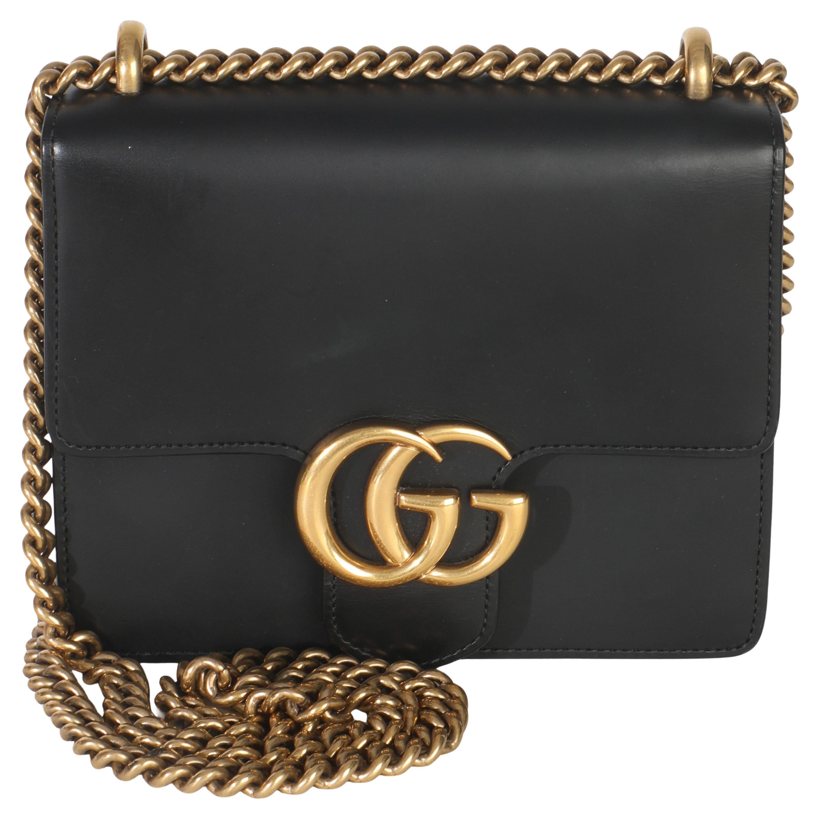 Gucci Borsa a catena piccola GG Marmont in pelle di vitello liscia nera