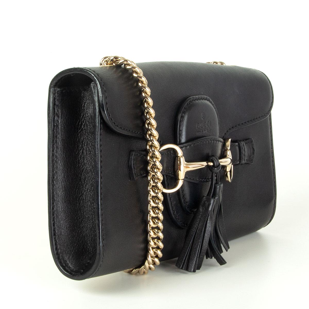 Gucci Emily shoulder bag in black calfskin with tassel and horsebit buckle detail in light gold-tone. Lined in black leather with one open pocket against the back. Has been worn and is in excellent condition. Comes with dust bag. 

Height 15cm