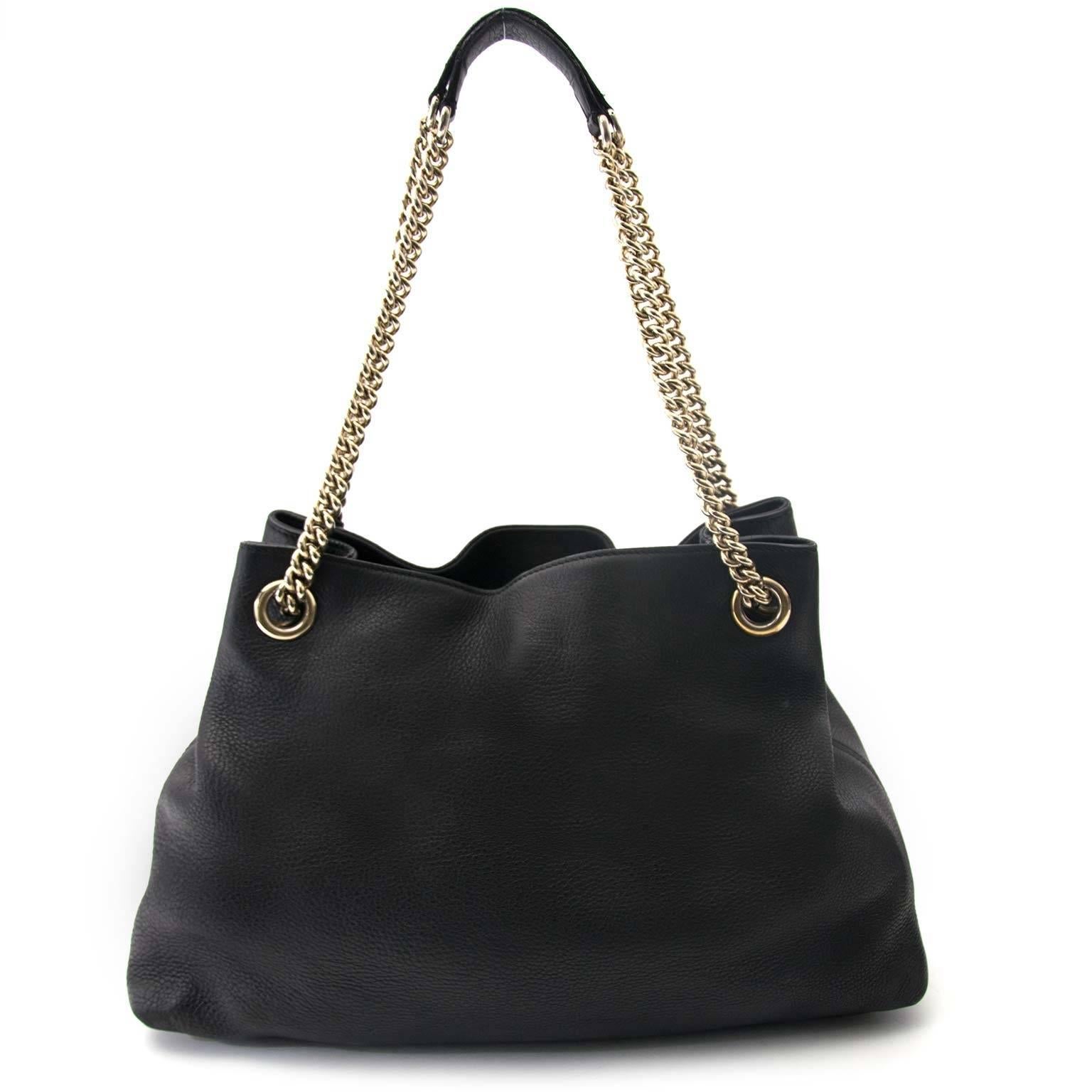 black gucci bag with chain strap