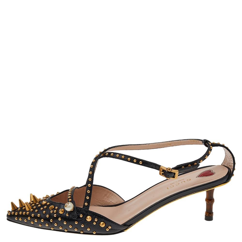 These pointed-toe pumps from Gucci have come straight from a shoe lover's dream. Crafted from black leather, detailed with studs and spikes, and balanced on short bamboo heels, the pumps are lovely and gorgeous!

Includes: Original Dustbag, Original