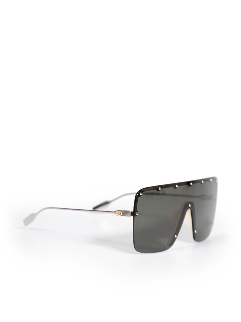 CONDITION is Very good. Hardly any visible wear to sunglasses is evident on this used Gucci designer resale item. This item comes with its original dust bag.
 
 
 
 Details
 
 
 Black
 
 Metal frame
 
 Shield sunglasses
 
 Studded detail
 
 Black