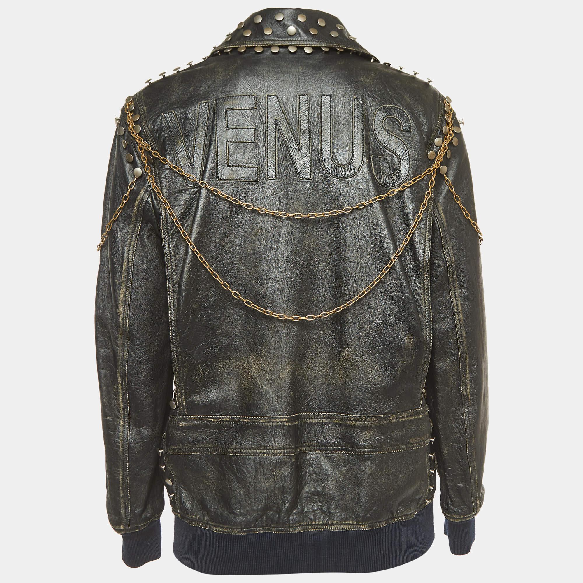 The Gucci jacket exudes timeless sophistication. Crafted from high-quality leather, its sleek black hue is complemented by edgy silver studs. The vintage-inspired design is a standout piece for those seeking both style and attitude.

