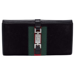 Portafoglio Gucci in tela e camoscio nero