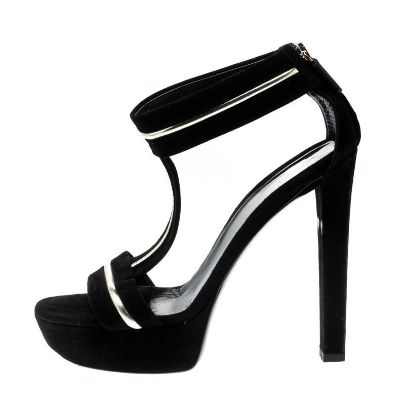 There's nothing we don't love about these gorgeous platform sandals from Gucci! The lovely black sandals are crafted from suede and feature a t-strap design and leather detailing. They come equipped with back zippers, platforms and 14 cm block