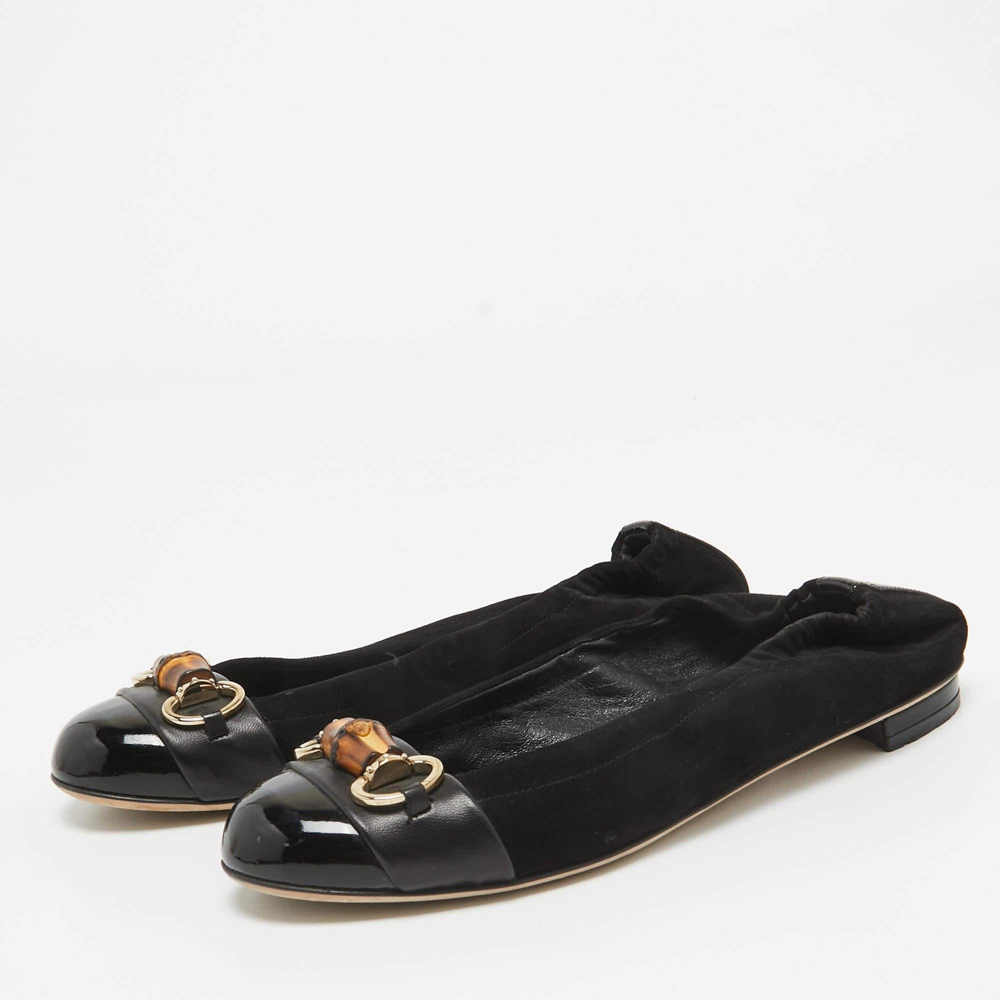 Designed in keeping with the classic ballet flat look these Gucci shoes are luxuriously stylish and effortlessly chic to pair with both your casual and casual chic looks. Constructed in suede these shoes feature bamboo accents on the front and low