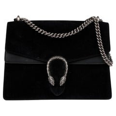 Bolso mediano Dionysus de Gucci en ante negro y piel lisa negra