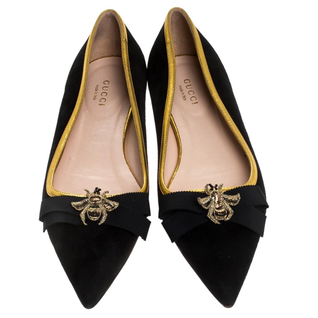 These chic ballet flats from Gucci will make your feet look pretty and fashionable. Chic and sassy, these suede flats are designed with bee accents on the vamps. These pointed-toe flats will keep your style value on top. Team these black ballet