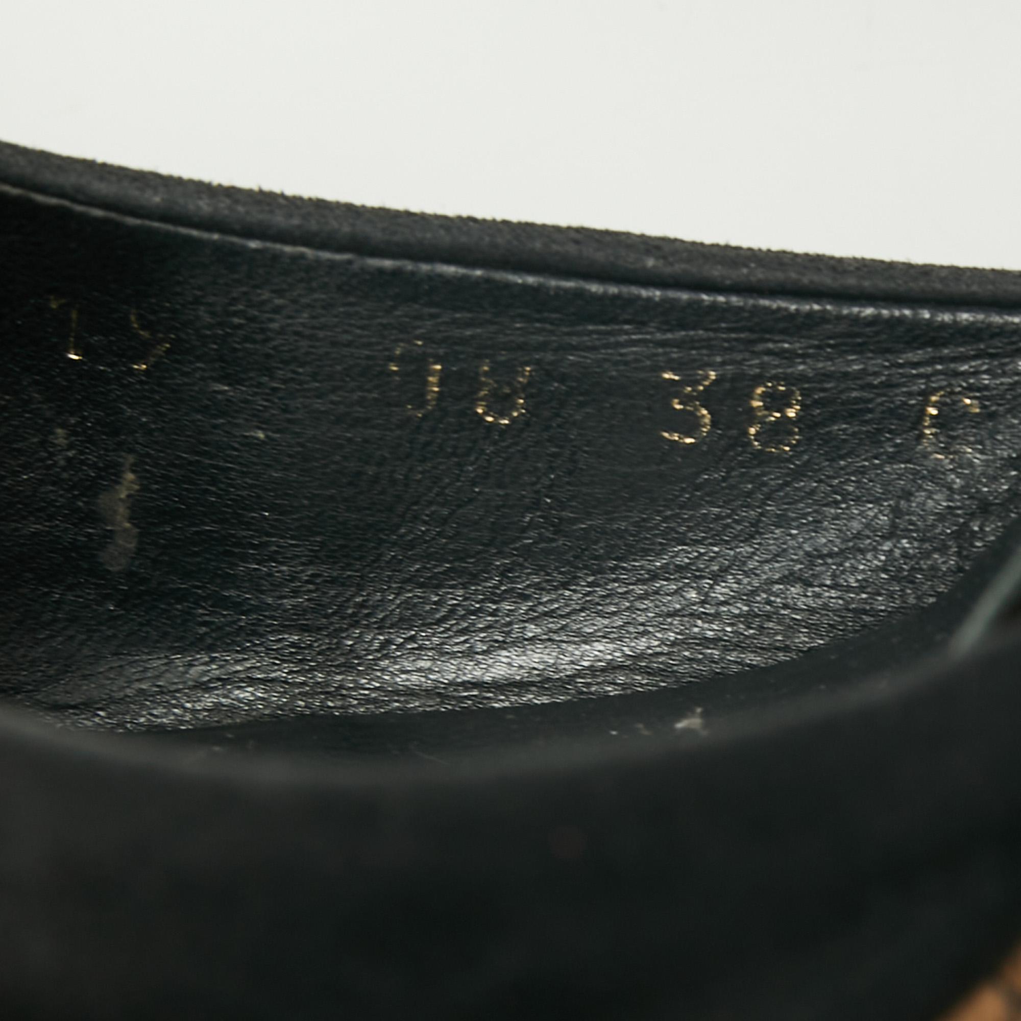 These Gucci cork wedges ooze maximum style and beauty. Crafted from black suede, the platform sandals feature gold-tone detailing along with buckled ankle straps and sturdy rubber soles. They strike the right balance between comfort and