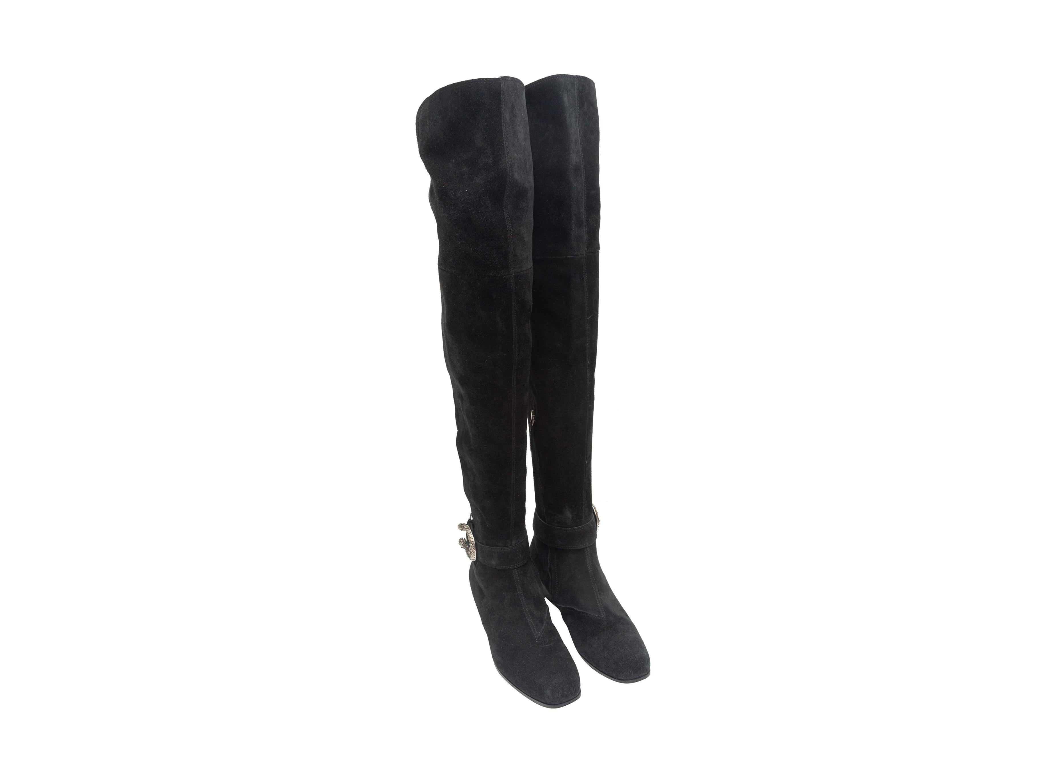 Product details: Black suede Dionysus thigh-high boots by Gucci. Silver-tone buckle accents at sides. Designer size 37. 1