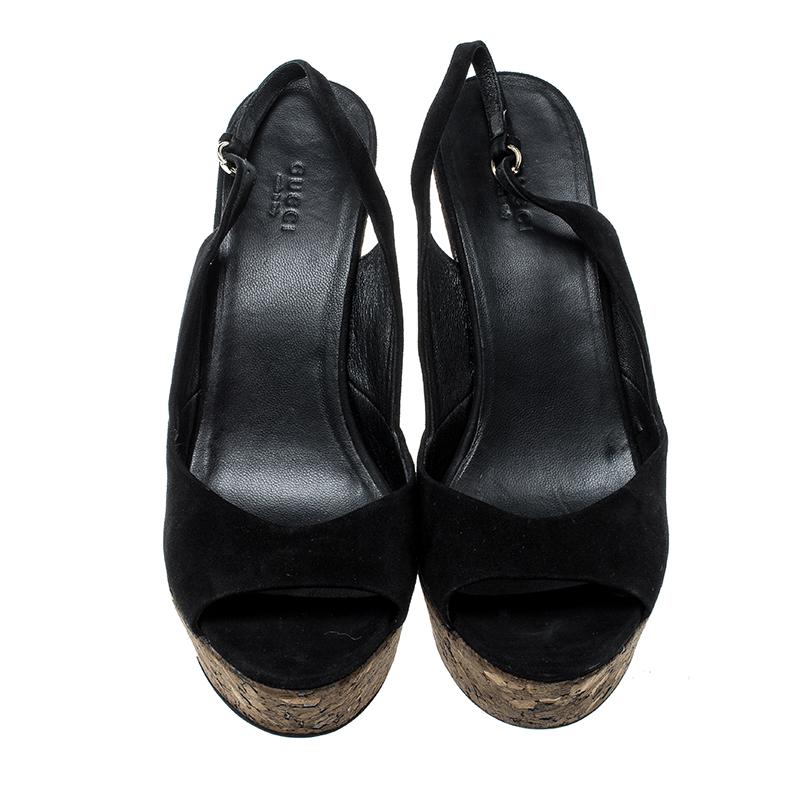 This pair from Gucci definitely deserves your love as it is well-built and exquisite in appeal. They've been crafted from suede and styled with buckle slingbacks, peep toes and 13 cm cork heels supported by cork platforms.

Includes: The Luxury