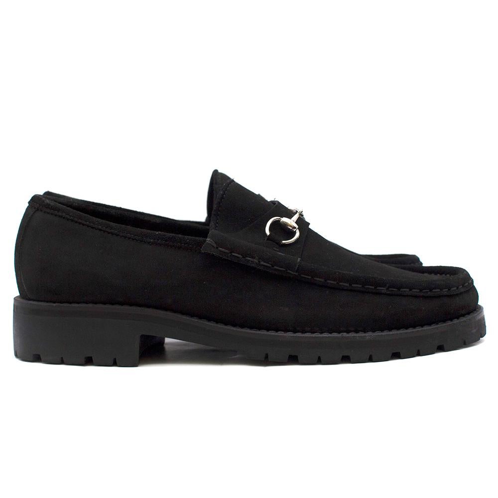 Gucci Black Suede Horsebit Loafers
 
- Silver-tone horse-bit hardware to the front, 
- Leather lining,
- Rubber outsoles,
- Dust bag included

Please note, these items are pre-owned and may show some signs of storage, even when unworn and unused.